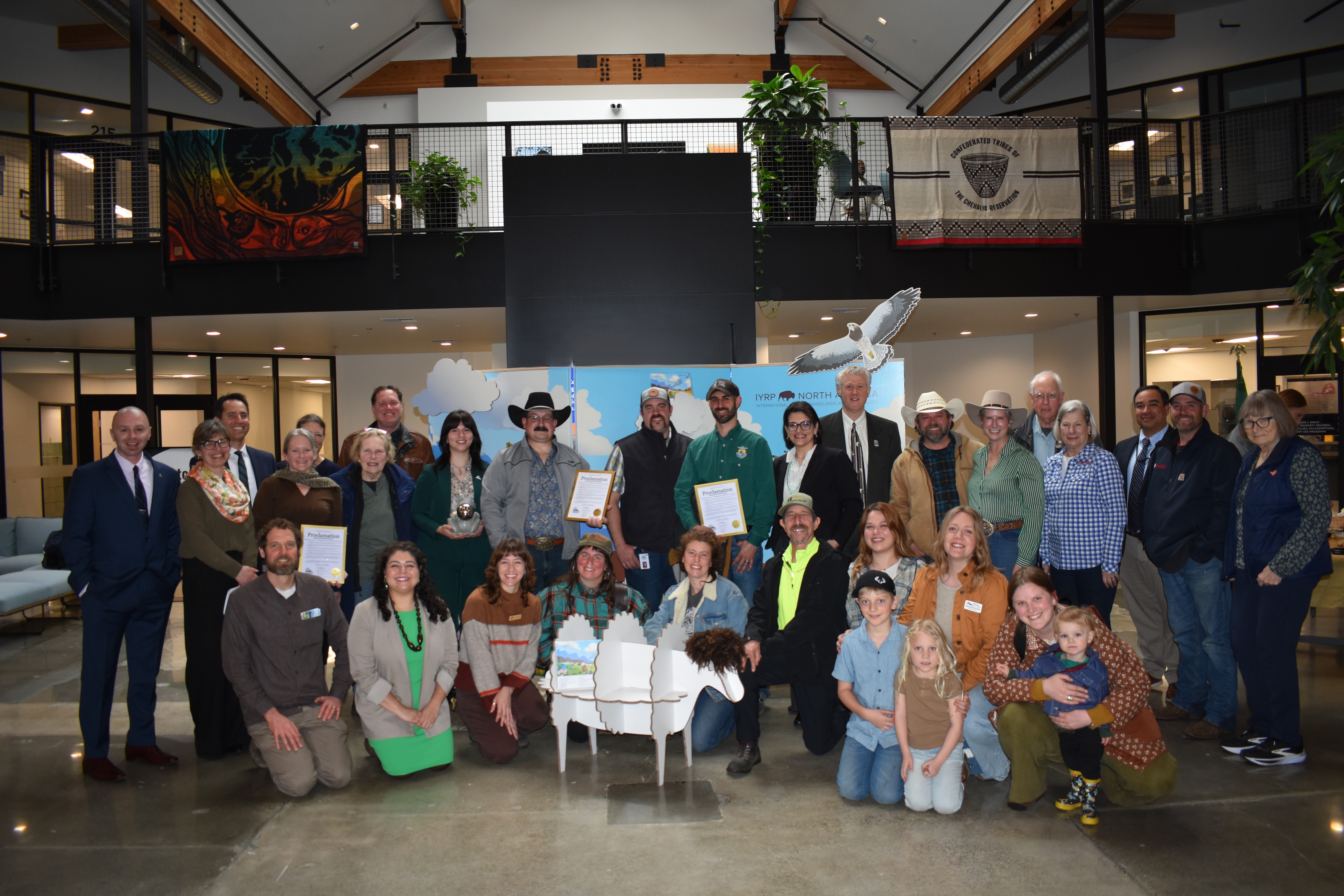 IYRP Proclamation celebrations group in front of the exhibit