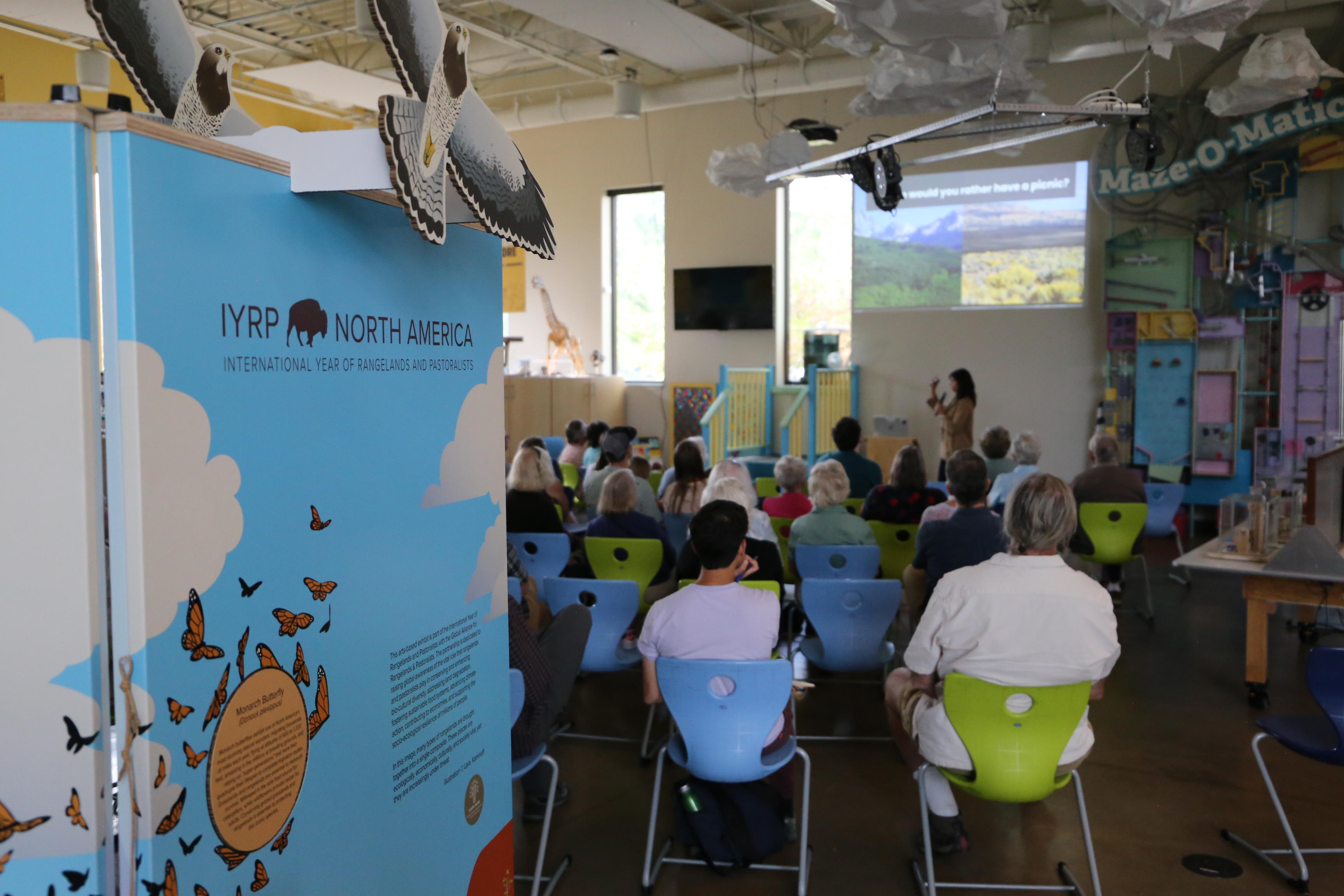 Attendees listening to a talk at the Eureka Science Museum
