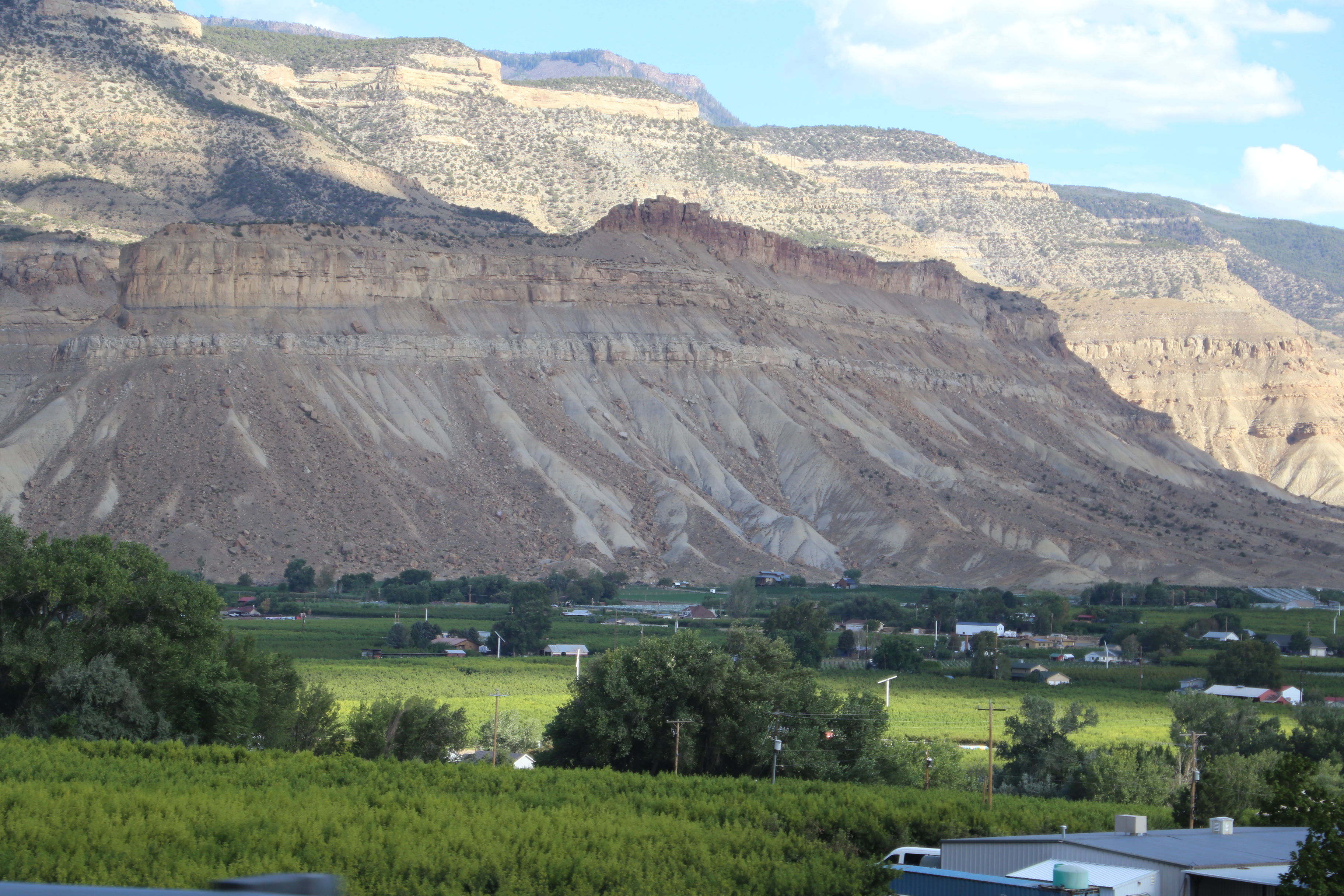 Descent from Grand Mesa past peach orchards in Palisade, the peach capital of Colorado 